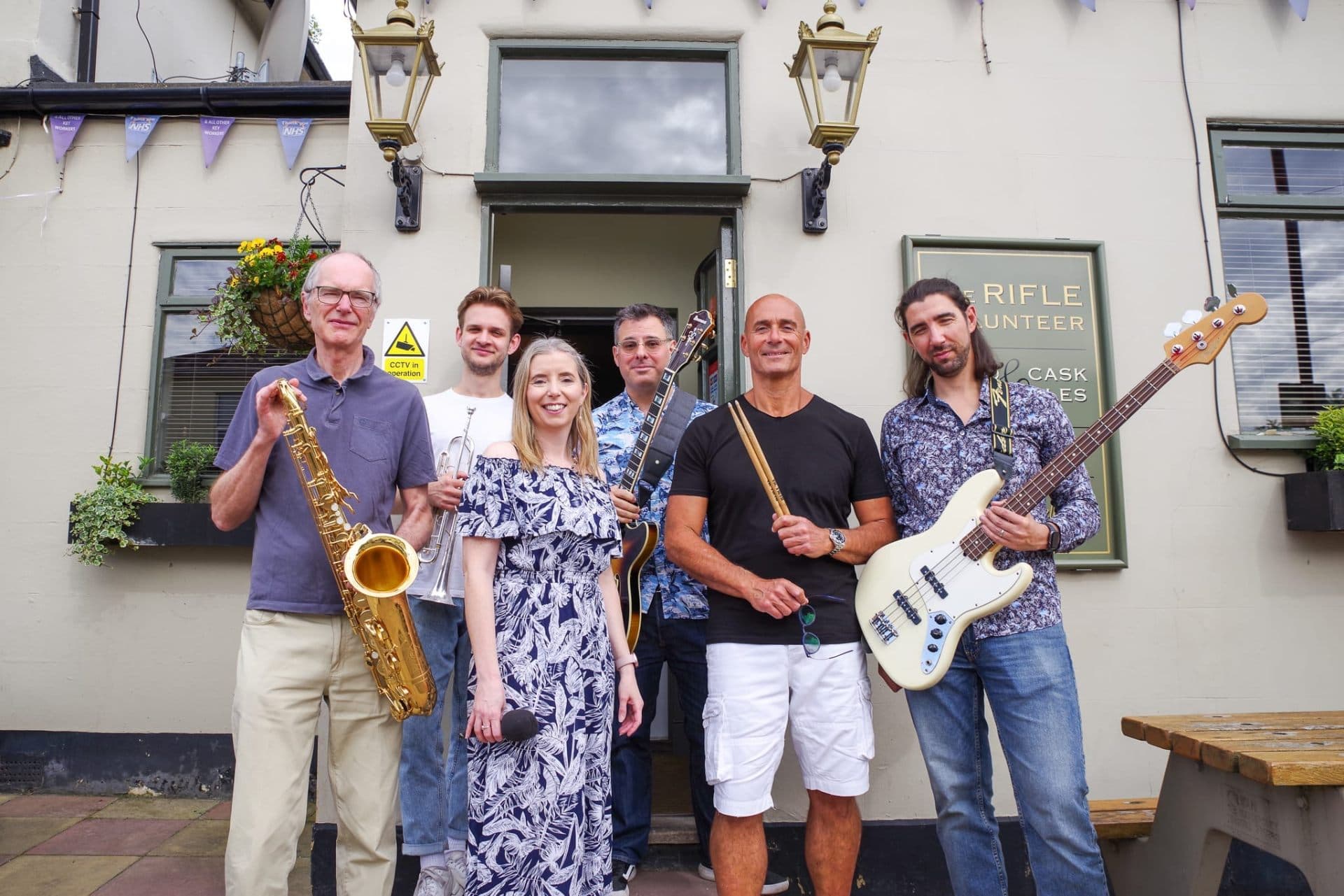 The Out of Handers performing live